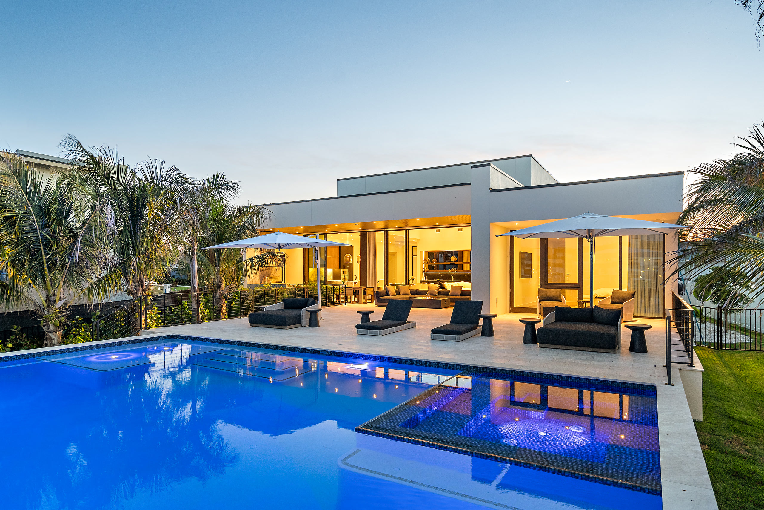 501 Barcelona infinity pool and modern architecture at twilight